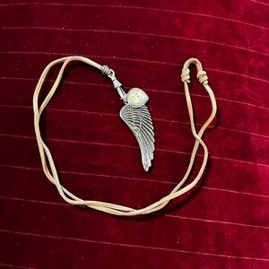 Silvertone Wing and faceted Pendant Necklace.